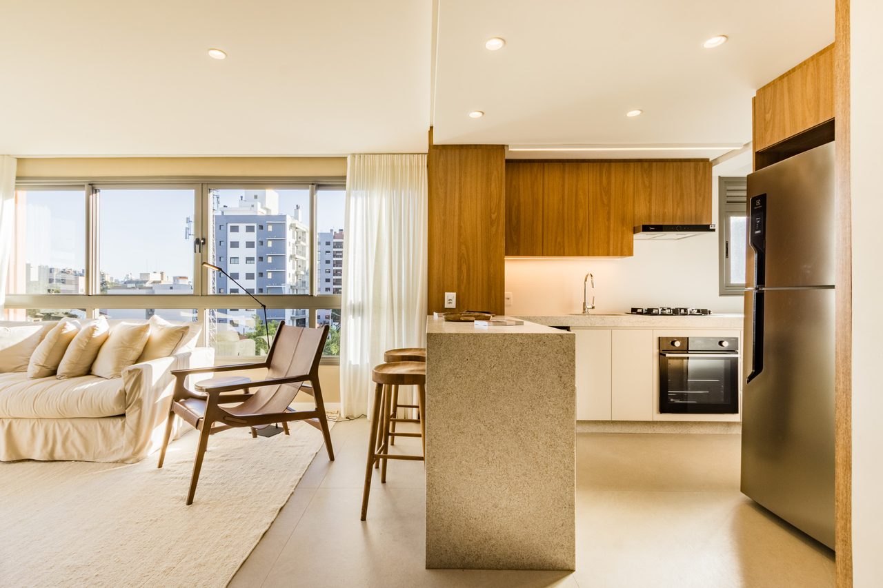 Living do apartamento decorado do Artus — vista 3 (jantar integrado à cozinha)